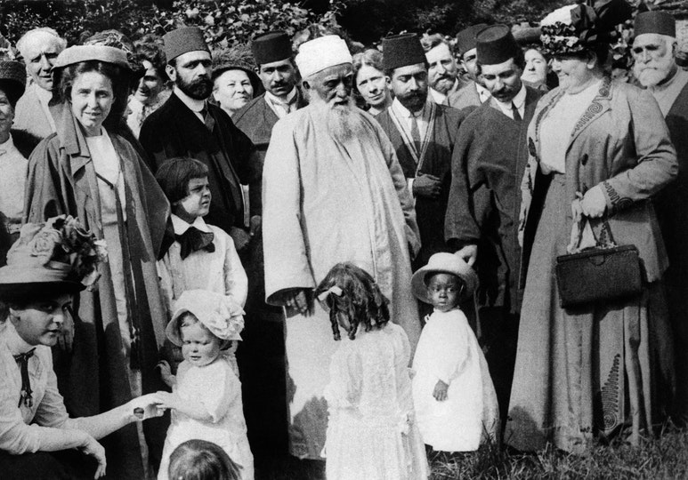 ‘Abdu’l-Bahá with a group of friends in Brooklyn, New York, June 1912.